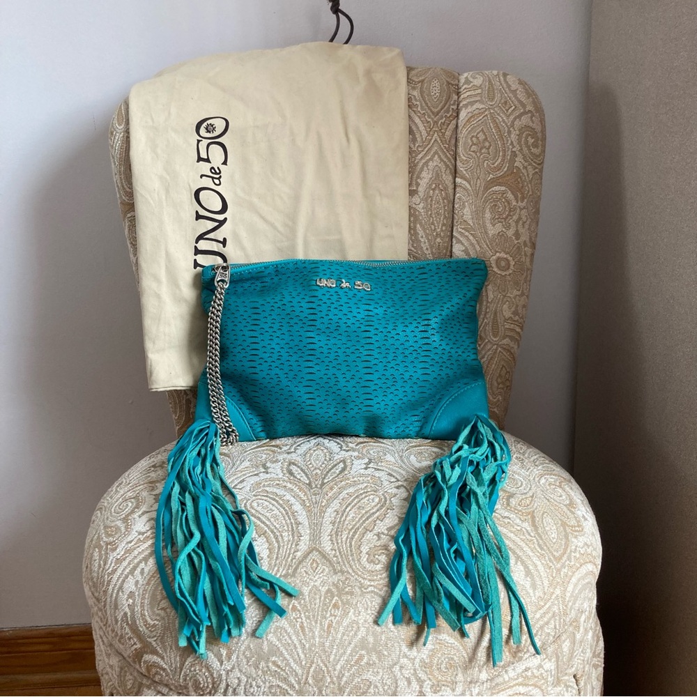 UNO de 50 | Spain Rare Teal Cut-Out Leather Fringe Wristlet Bag